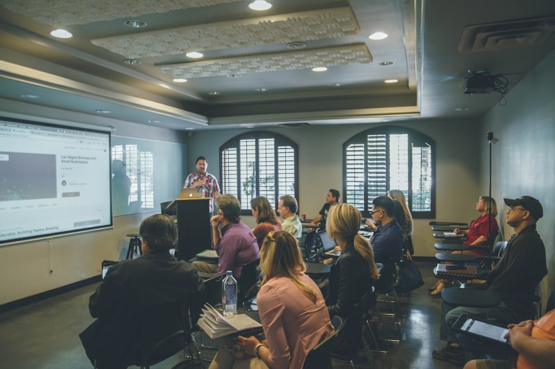 Entrepreneurs accessing business resources and training materials